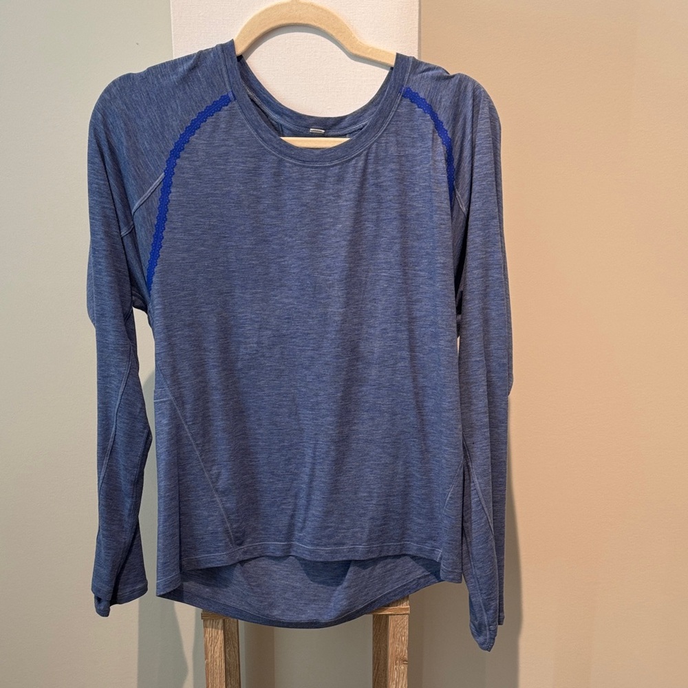 lululemon athletica Heathered Blue Long Sleeve Top. Crisscrossed open back